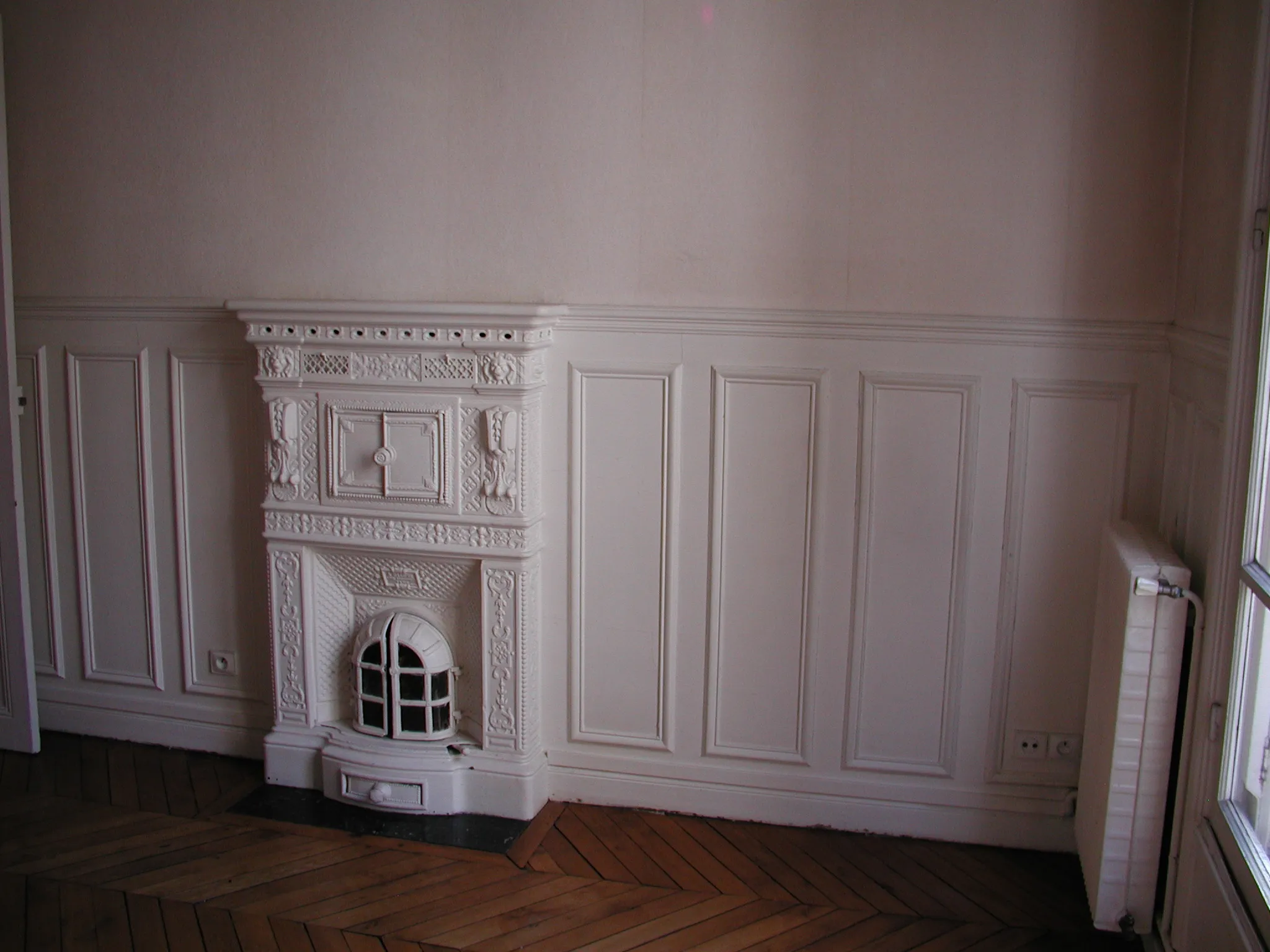 parquet wood flooring and mini chimney