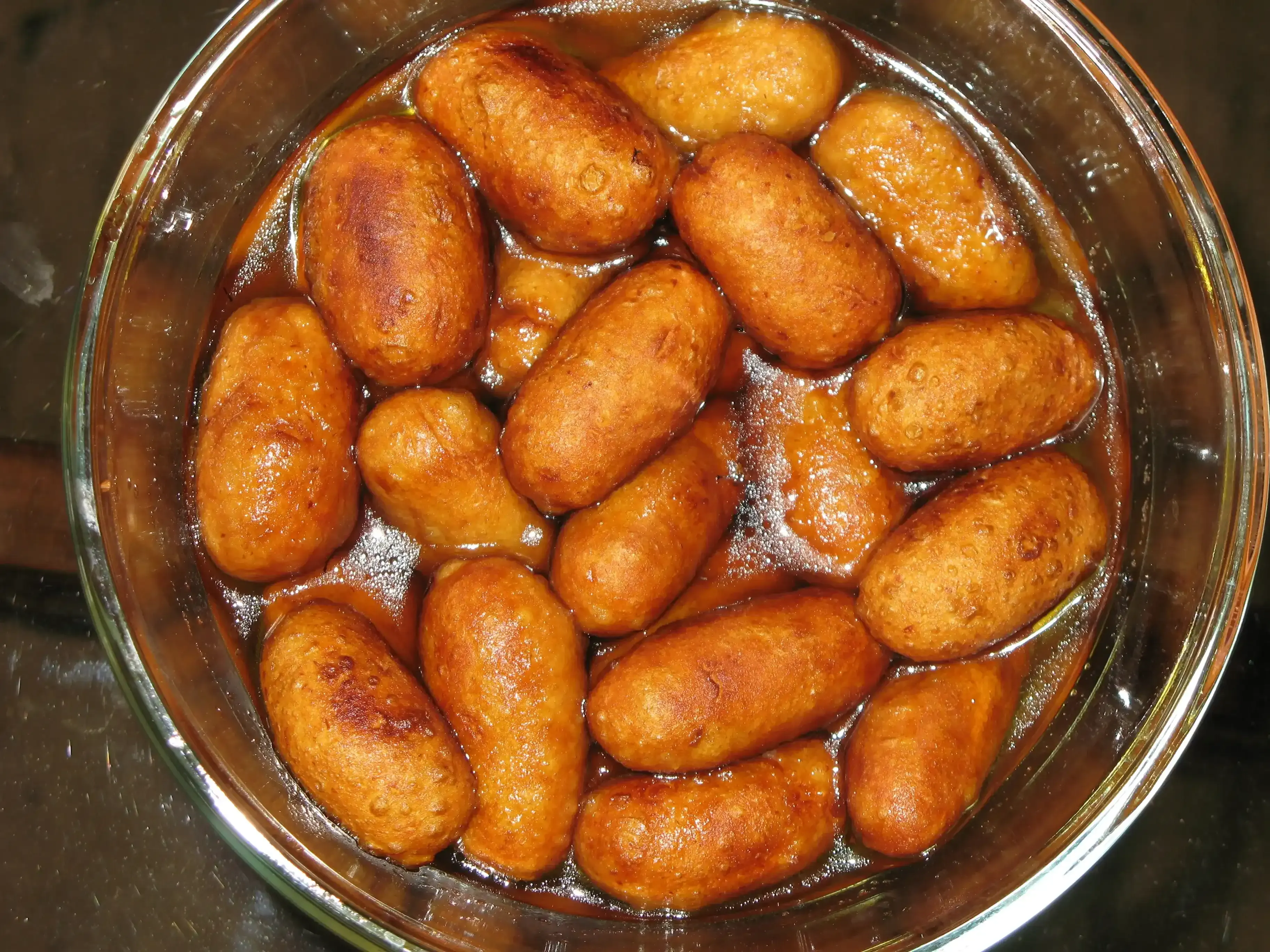 Ranga Alur Puli / Fried Sweet Potato Dumplings in Jaggery syrup