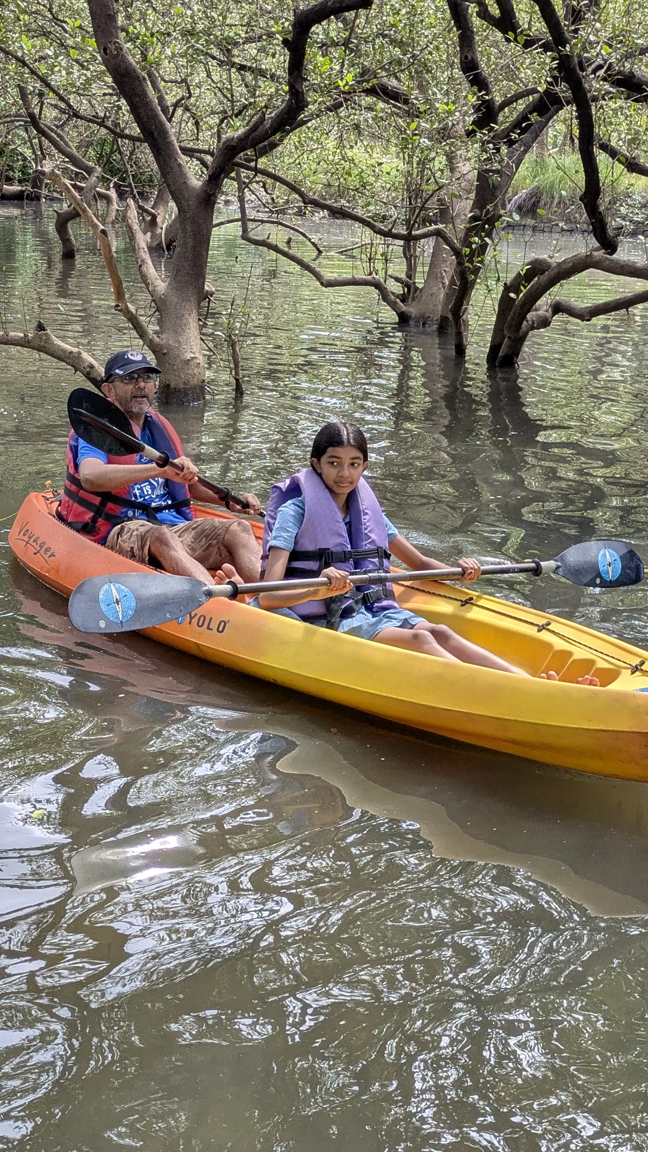 Santanu with Anya kayaking